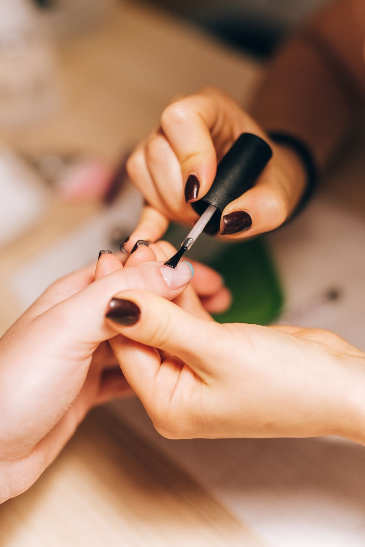 Close-up of elegant nail polish application